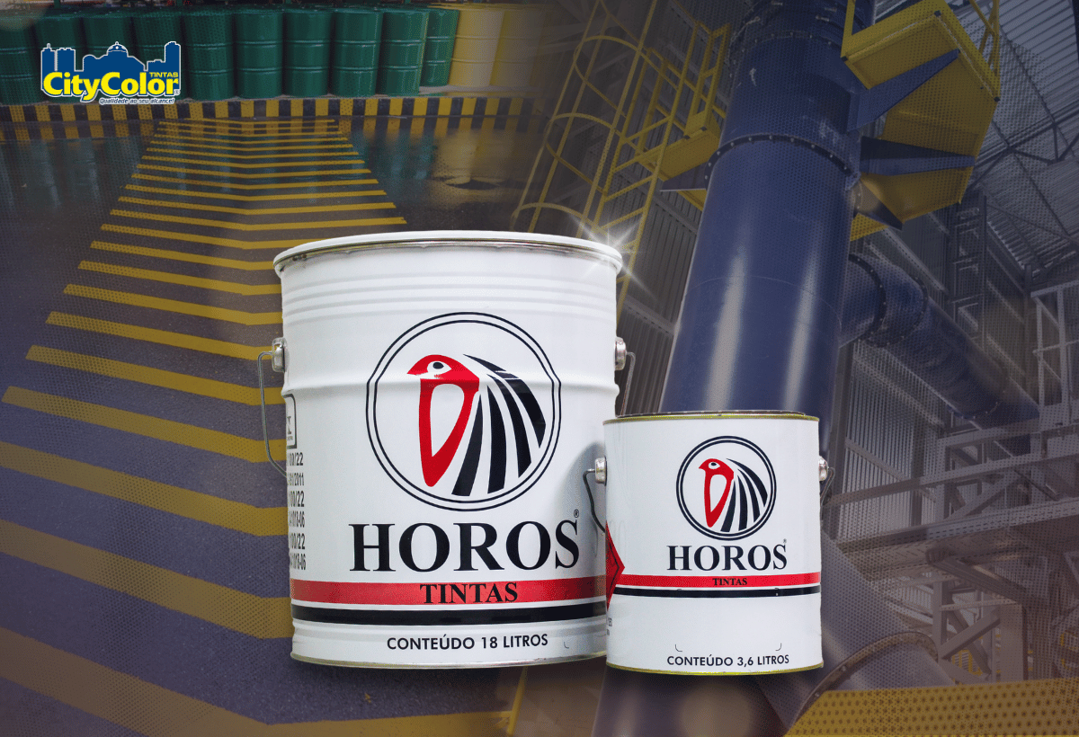 Tinta epóxi Horos para demarcação viária e industrial em latas, com fundo de piso sinalizado em ambiente industrial