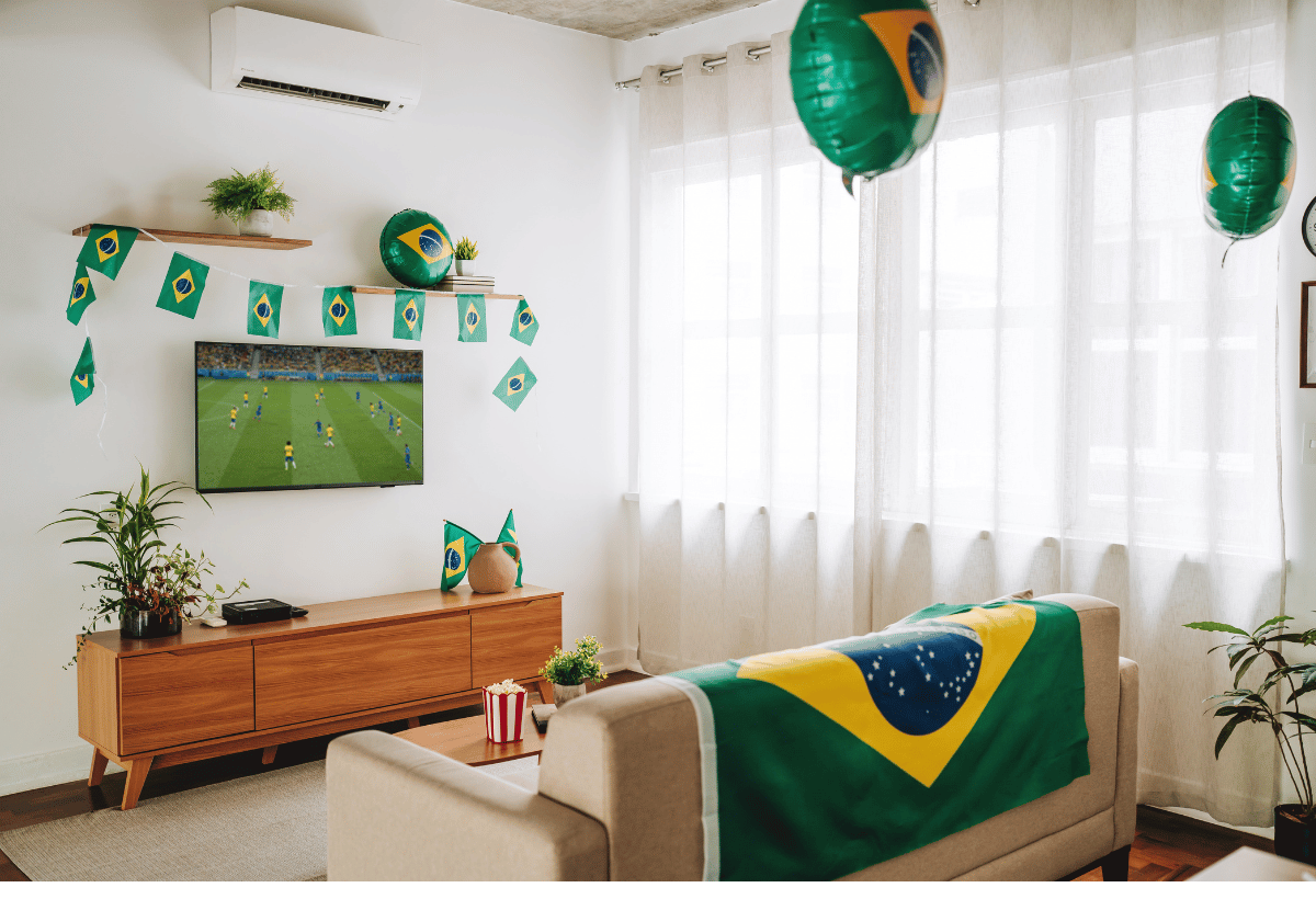 Ambiente residencial decorado com as cores da bandeira do Brasil para criar clima de torcida em casa